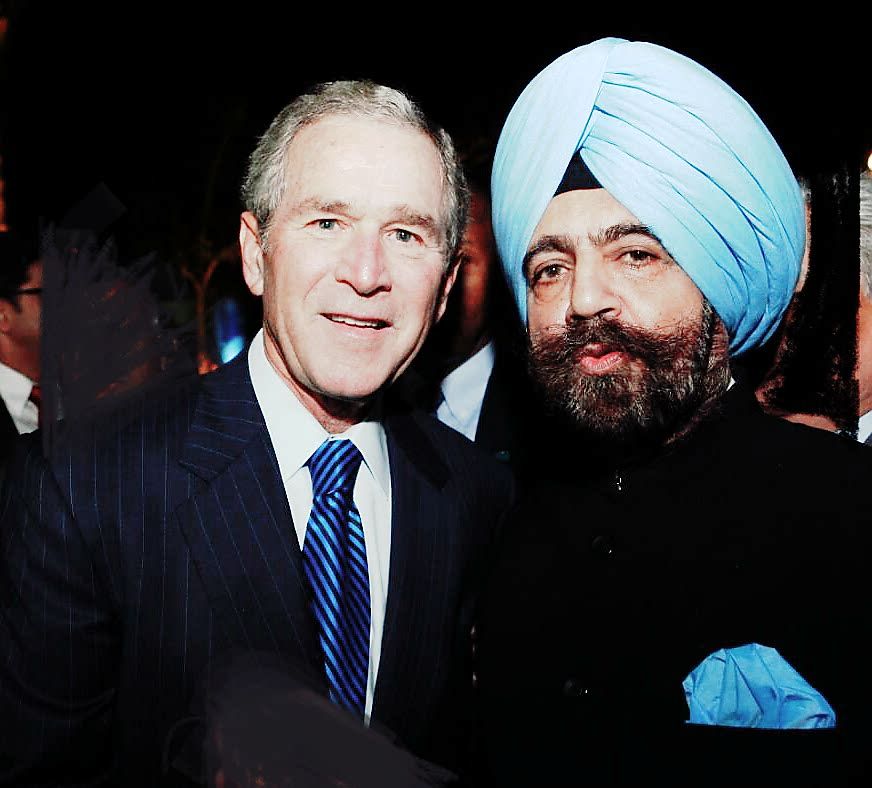 Mr. Dalbir Singh chairman one globe with George W Bush President of U.S.